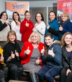 Corporate team celebrating successful business collaboration and professional development achievements
