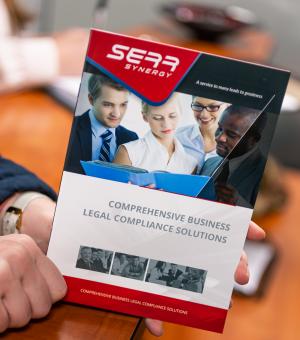 Close-up of corporate business brochure showcasing legal compliance services